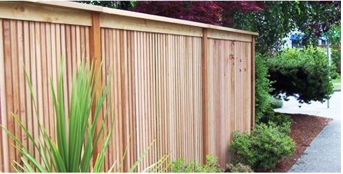 A wooden fence with a sturdy post, emphasizing the right fencing choices for homes in Seattle, WA
